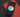 Smartphone på rød baggrund, der symboliserer digital optimering og synlighed gennem Google My Business.